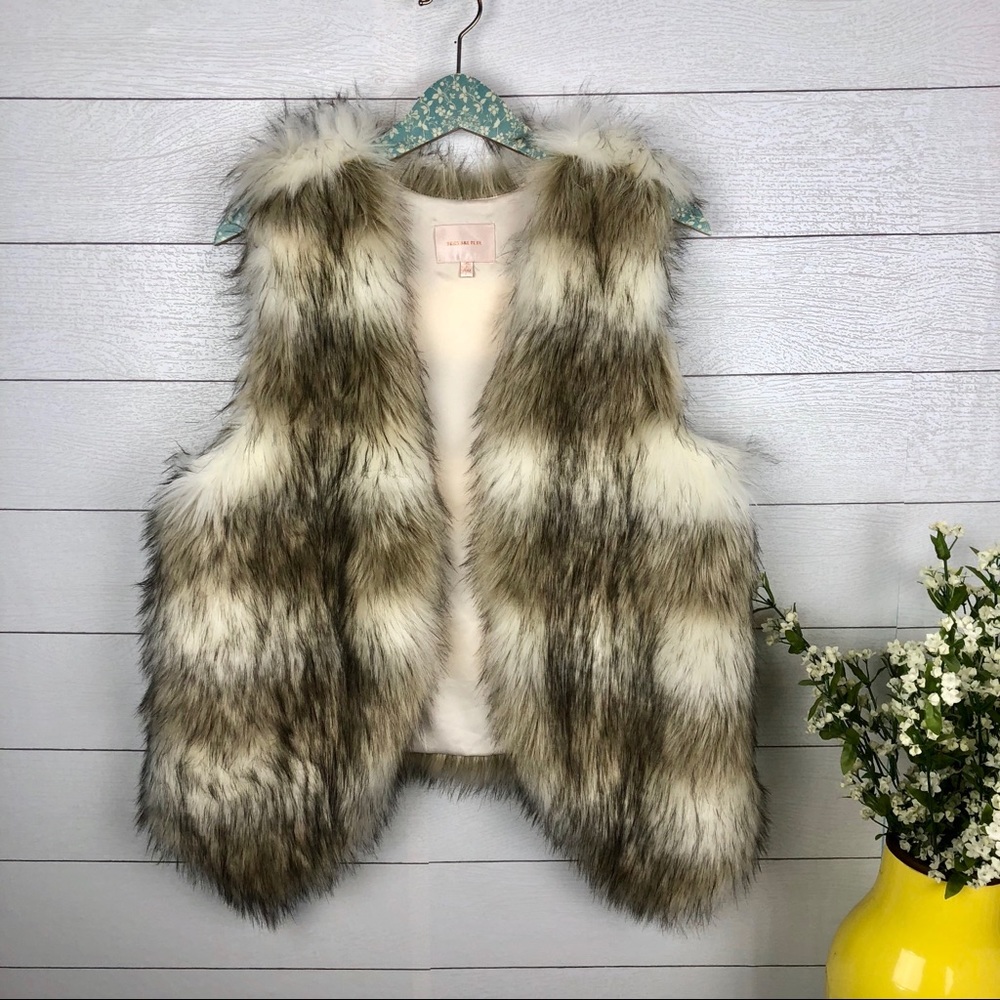 Skies are blue faux fur vest